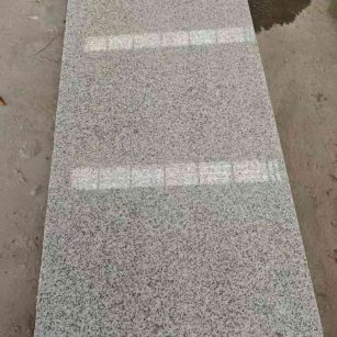 阳泉芝麻白光面毛板